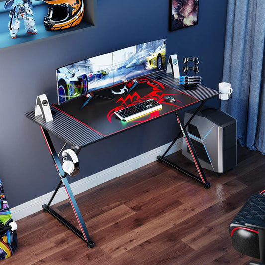 EE  Gaming Desk, 47 Inch Gamer Workstation, Carbon Fiber Surface Gaming Computer Desk with Large Mouse Pad, Controller Race, Headphone Hook, Cup Holder, Socket Holder,Black